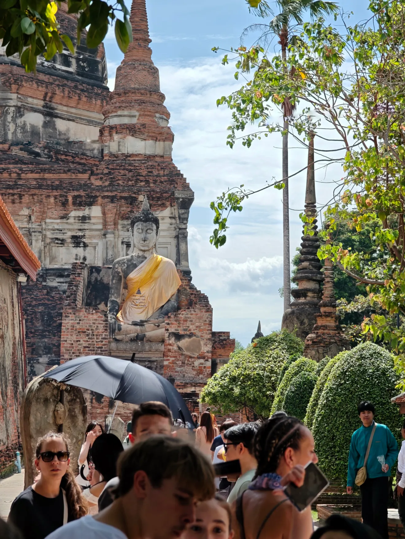 a masive aincent temple on the grounds at ayuttaya